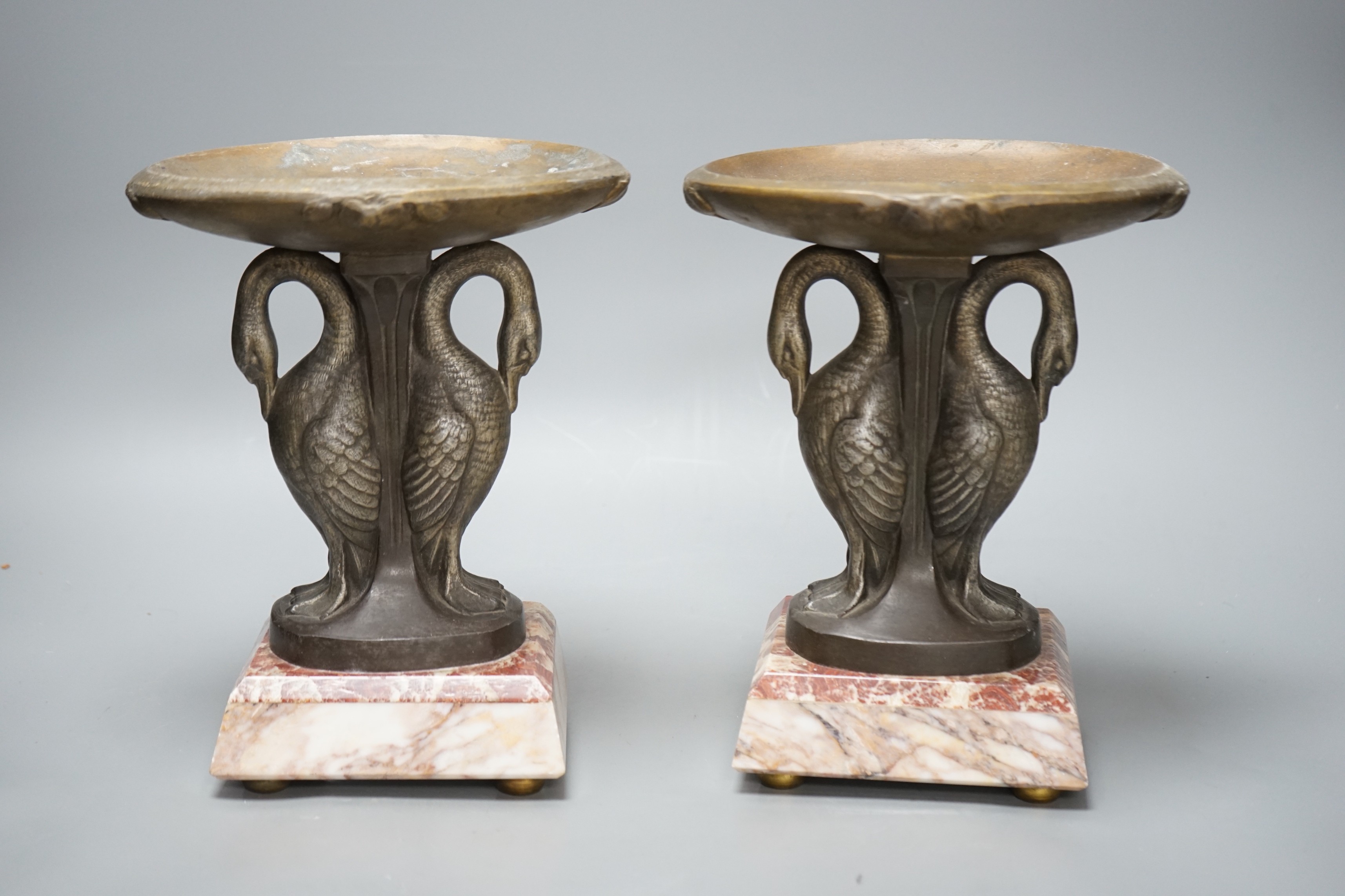 A pair of Art Deco spelter and marble ‘swan’ garnitures, 24cm